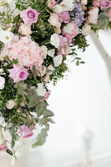 Close up flowers on the white background with the place for your text. Wedding decoration. Floral background