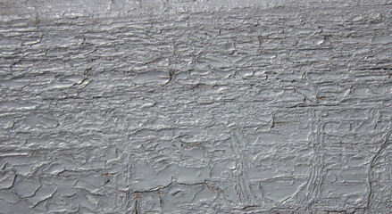 Texture of gray rough cracked paint wall. Background.