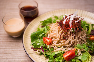 japanese cold buckwheat soba noodle salad with ponzu and creamy sesame dressing