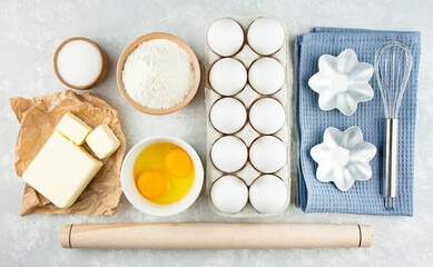 Ingredients and utensils for making homemade cakes. Home kitchen. Copy space. Food knolling. The apartment was lying.