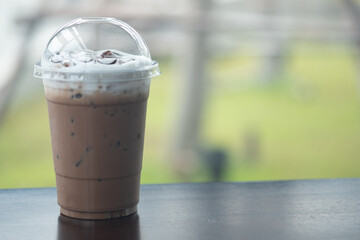 Iced mocha coffee with milk cream on top