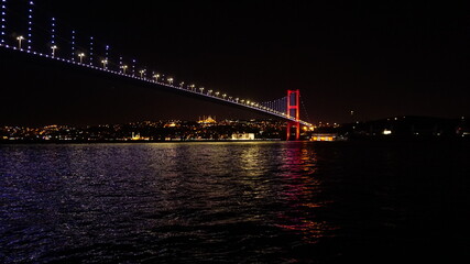 Fototapeta premium Bosphorus bridge in Istanbul, black sky and sea 