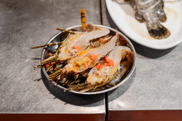 Cooked horseshoe crabs in plate at an Asian restaurant