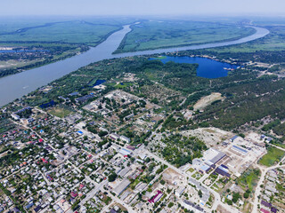 Aerial view on Vilkovo city (Ukrainian Venice, city built on water) on backgrund is Ermakov island