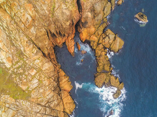 Rocky coast in Galicia. Cape Vilan Lighhouse Area. Spain. Drone Photo