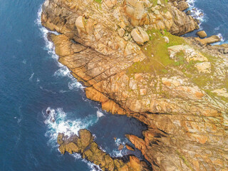 Rocky coast in Galicia. Cape Vilan Lighhouse Area. Spain. Drone Photo