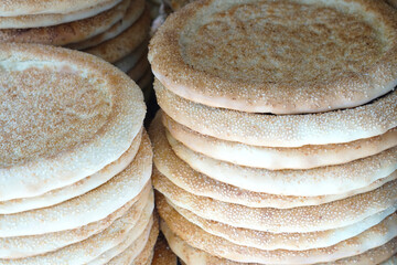 close up on stacking nang flat bread in Muslim market