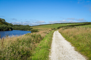 Fototapeta na wymiar Path around Upper Tamar Lake, on the Devon / Cornwall border, UK.