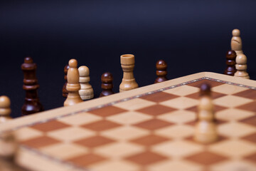 Chess, the pieces that are out of the game are outside the chessboard.