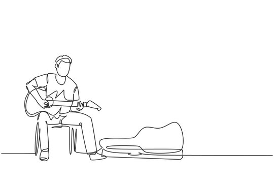One continuous line drawing of young happy male guitarist sitting and busking by playing guitar on uptown road. Street musician artist performance concept single line draw design vector illustration
