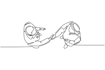 Single continuous line drawing of young happy muslim business man handshake his partner top view. Arab middle east businessmen with shmagh kandura robe cloth. One line draw design vector illustration