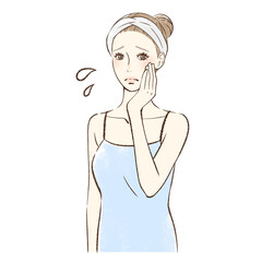 手のひらで頬をなでる不安そうな女性