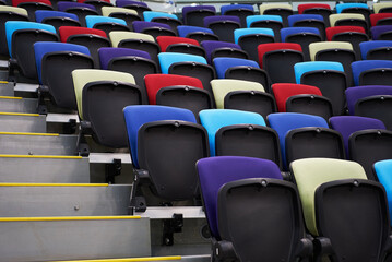Naklejka premium Empty stadium seats, close-up. Colorful seats at the stadium