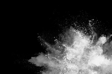White powder explosion on black background. Colored cloud. Colorful dust explode. Paint Holi.