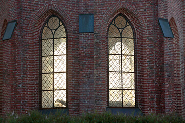 Fototapeta na wymiar Light coming through the chapel windows in the evening