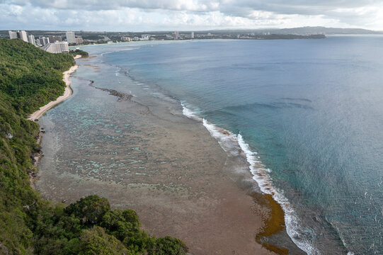 The coastline beneath Puntan Dos Amantes on Guam looks like a facial profile.