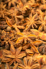 Star anise is the surface texture. Close up.
