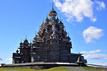 Church of the Transfiguration with hipped roofs covered with aspen similar to silver
