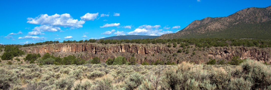 Ultra-wide panorama of the Rio Grande Gorge at Rio Grande del Norte National Monument in New Mexico