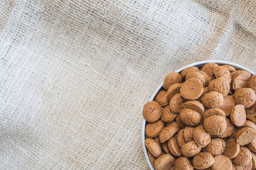 Top view of a bowl with spicy baked cookies, traditional in the Netherlands
