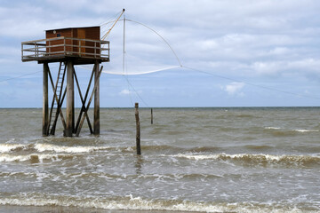 Fototapeta na wymiar Carrelet fishing hut at Tharon-Plage | Cabane de pêche au carrelet à Tharon-Plage
