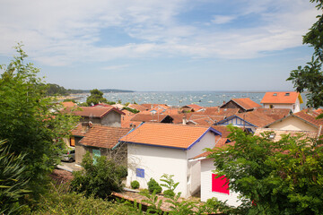 Picturesque wooden oyster village with its square and little alleys. L’herbe, Arcachon bay, France.