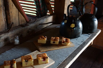 Afternoon tea and homemade raspberry cake in a cozy kitchen in Finland