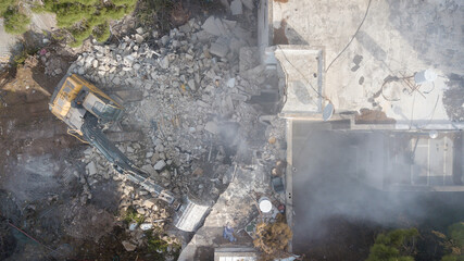  Urban Regeneration. Demolition of a building for new construction. Dismantling of a house....