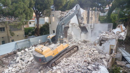  Urban Regeneration. Demolition of a building for new construction. Dismantling of a house....
