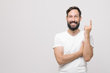  a young man came up with an idea and holds his index finger up