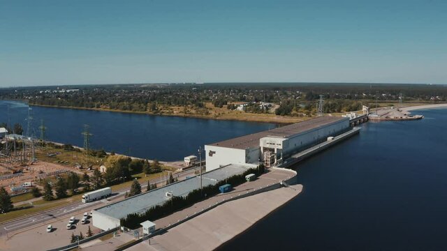Aerial view of the huge dam in Latvia near city of Salaspils and Riga. A huge reservoir of water and river Daugava.
