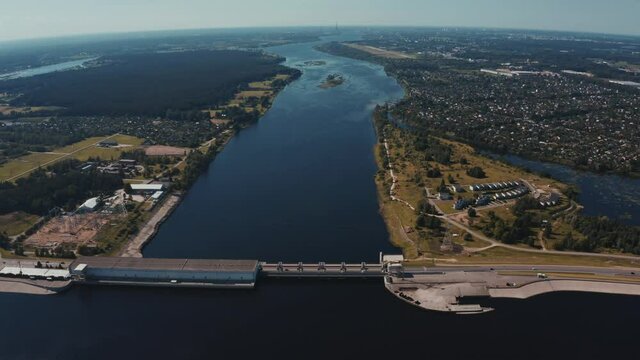 Aerial view of the huge dam in Latvia near city of Salaspils and Riga. A huge reservoir of water and river Daugava.