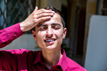 Handsome arabic guy feeling happy