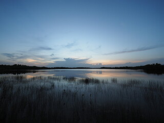 Morning twilight over Nine Mile Pond in Everglades National Park, Florida on perfectly calm summer morning.