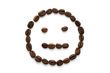 An image of an indifferent smiley face made of many coffee beans. Isolated on a white background