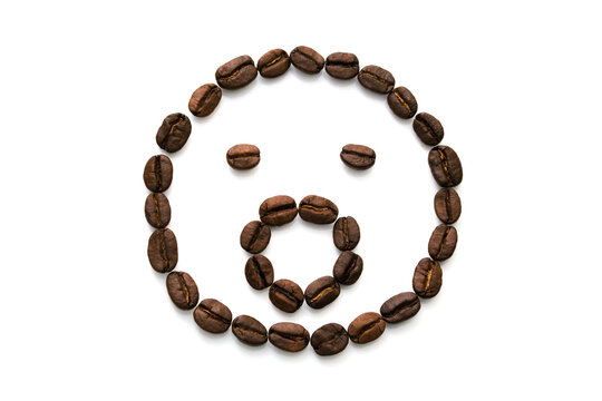 Image of a surprised smiley face from a variety of coffee beans