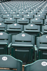 green plastic seats in stadium