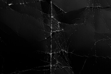 Abstract worn black background from crumpled paper