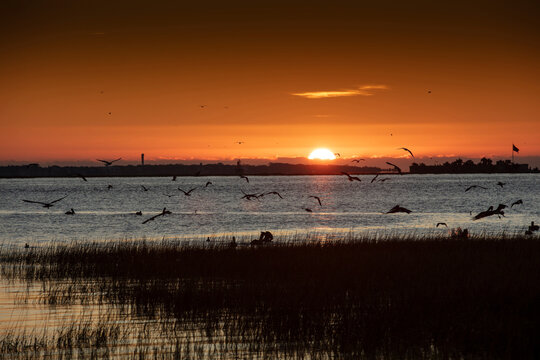 Charleston, South Carolina, United States, November 2019, the sunrise over Charleston Harbour bay looking in the direction of Fort Sumter