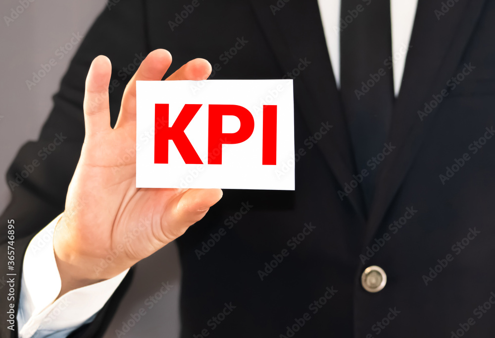 Poster office desktop - flat lay photo from above. caption - kpi key performance indicator. idea, evaluatio