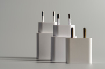 Different electric plug connector on grey background