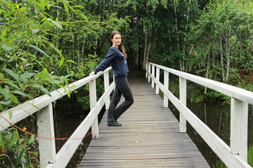 Fototapeta premium woman walking on bridge