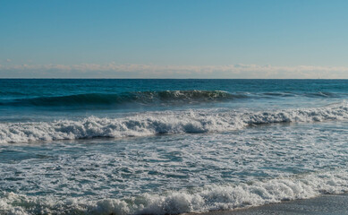 Seascape of whitecaps and blue sky