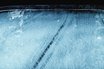 Closeup of a cracked ice texture. Studio macro shot.