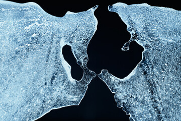 Closeup of a cracked ice texture. Studio macro shot.