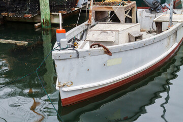 Fototapeta na wymiar Small Fishing Boat on Menemsha's Harbor, Chilmark, Massachussets, USA