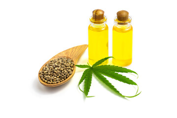 Hemp seeds and hemp oil on white background, CBD cannabis oil extract, marijuana  alternative herbal medicine concept.