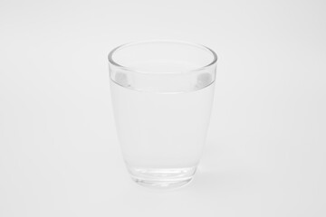 Clean water in a glass  on a white background