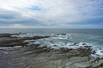 Fototapeta premium stormy sea and rocks