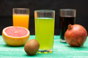 Summer drinks with fresh fruits. Three glasses